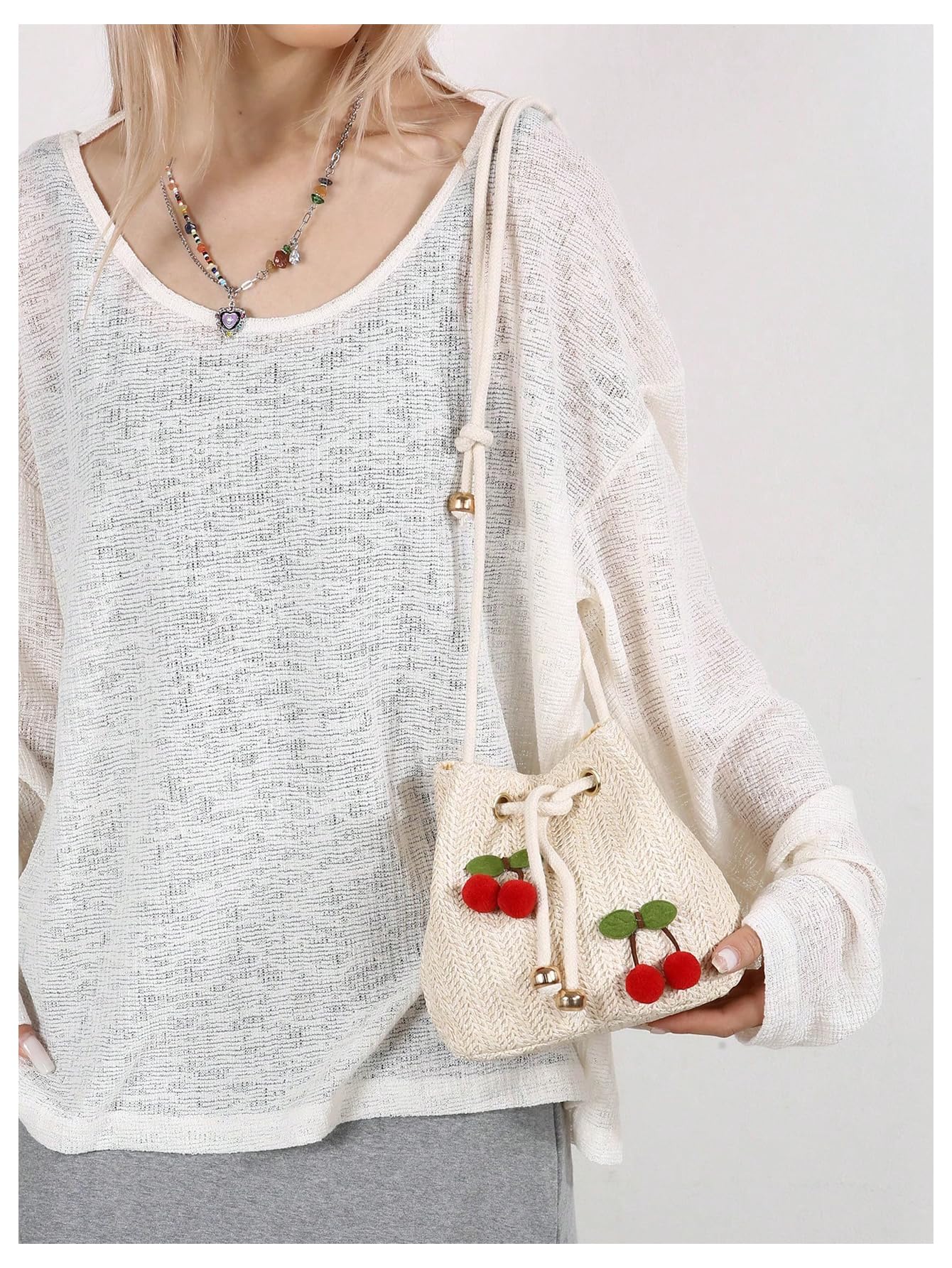 Beige woven drawstring cherry pom-pom bucket bag - Image 5