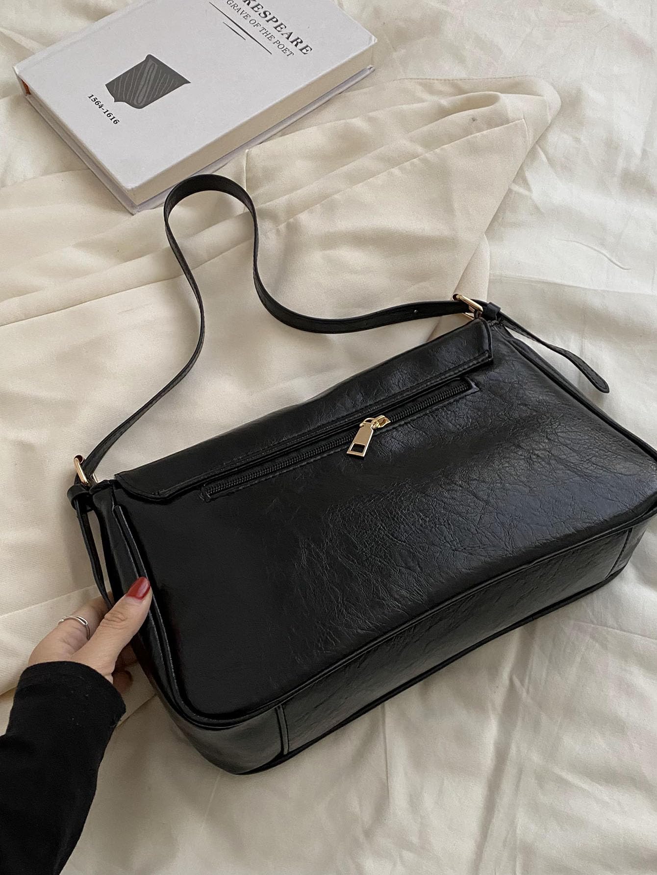 Black Minimalist Shoulder Bag with Ring Detail - Image 2